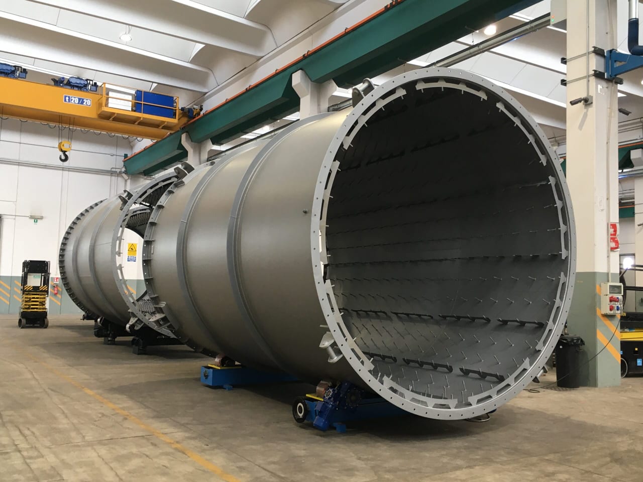 Large cylindrical exhaust duct with internal insulation pins, in the workshop