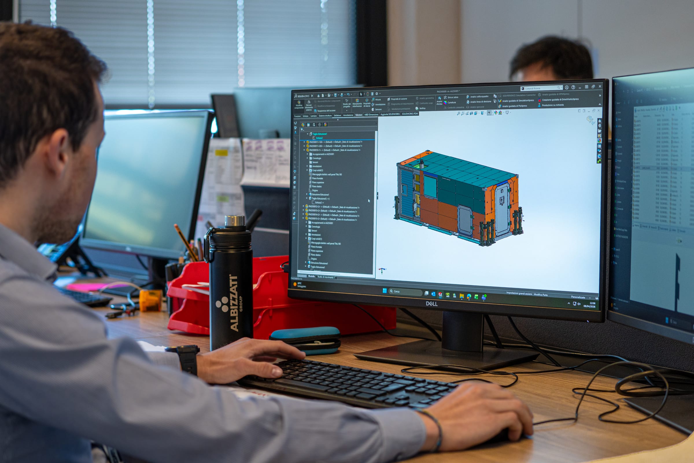 Engineer modelling a prefabricated module in 3D CAD software at the Magenta technical office